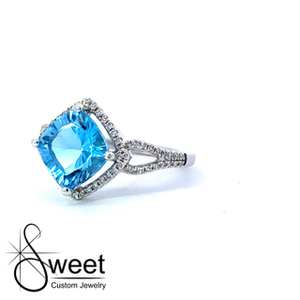 14kt white gold blue topaz and Diamond ring