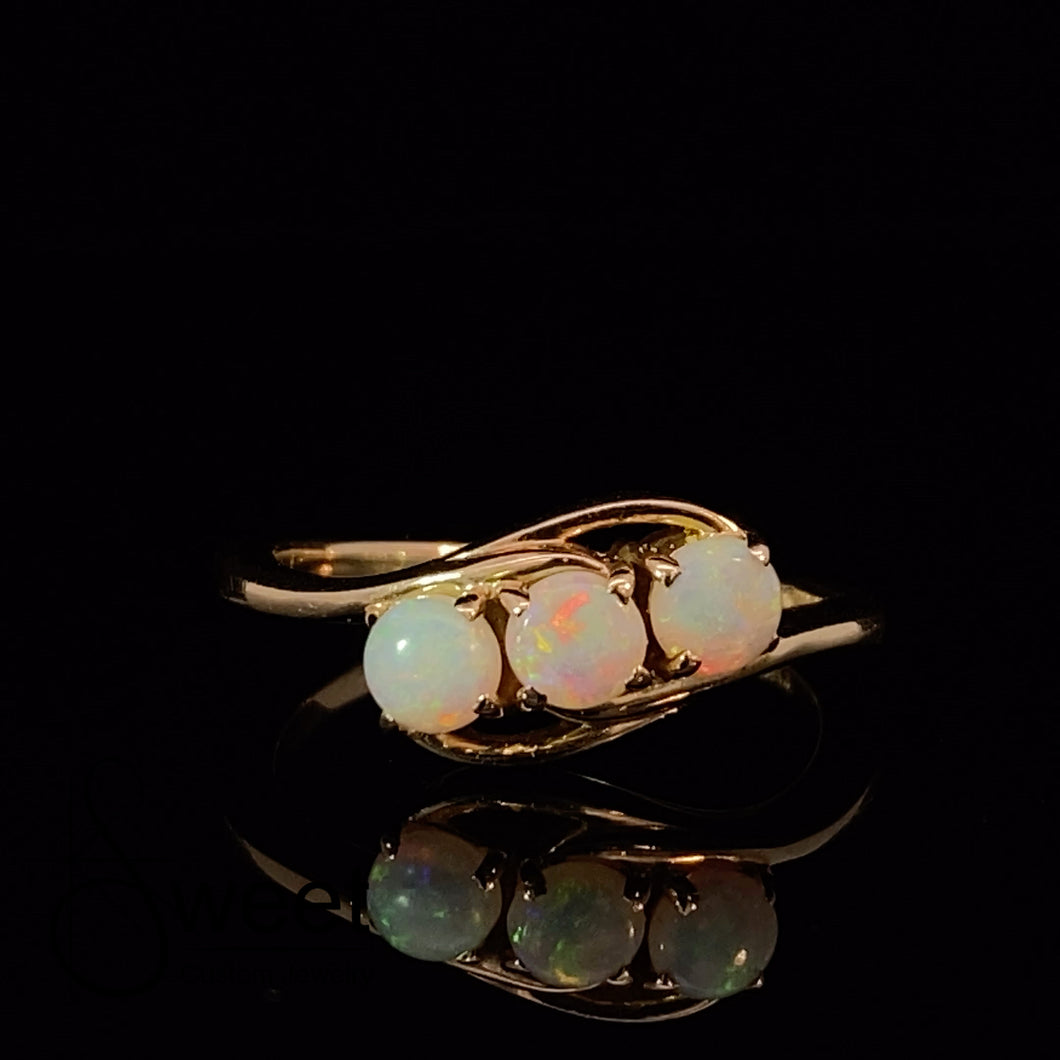 Yellow gold opal ring