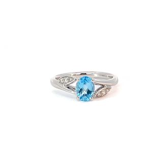 White gold ring blue topaz and diamond ring
