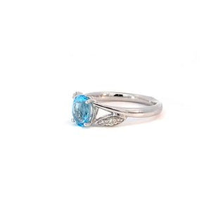 White gold ring blue topaz and diamond ring
