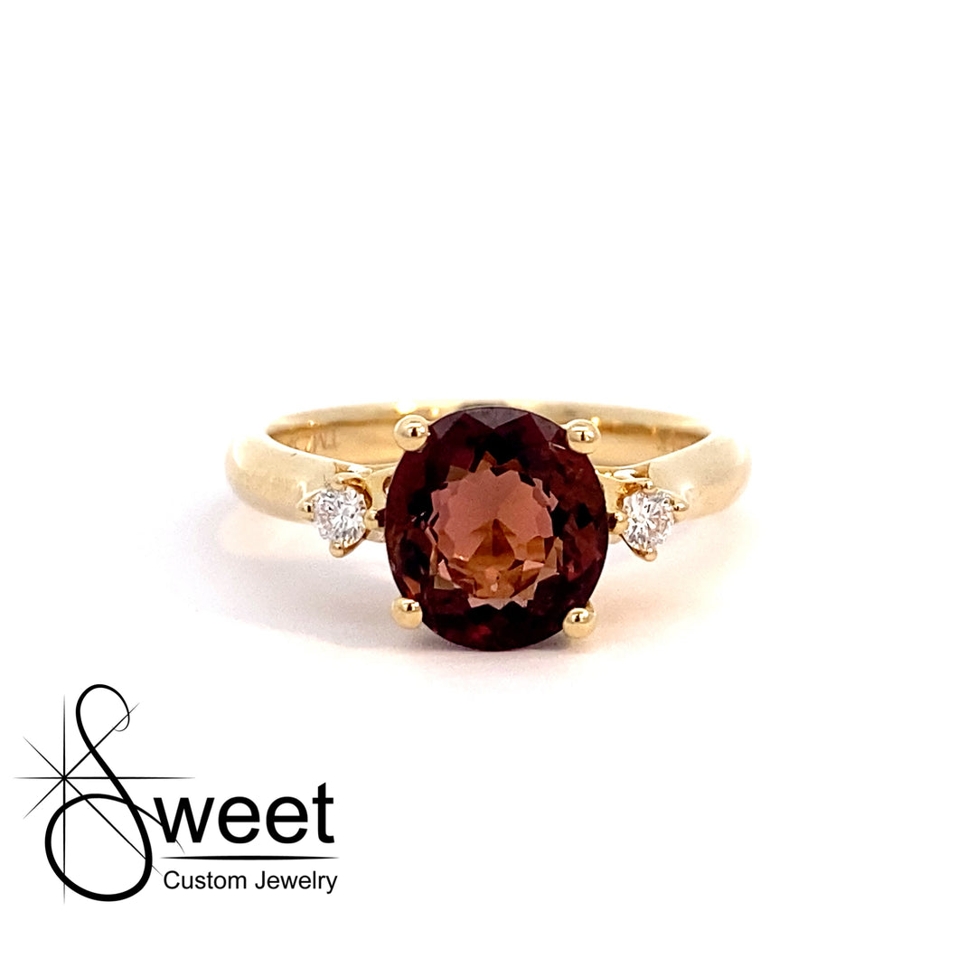 Yellow gold spiced tourmaline and Diamond ring