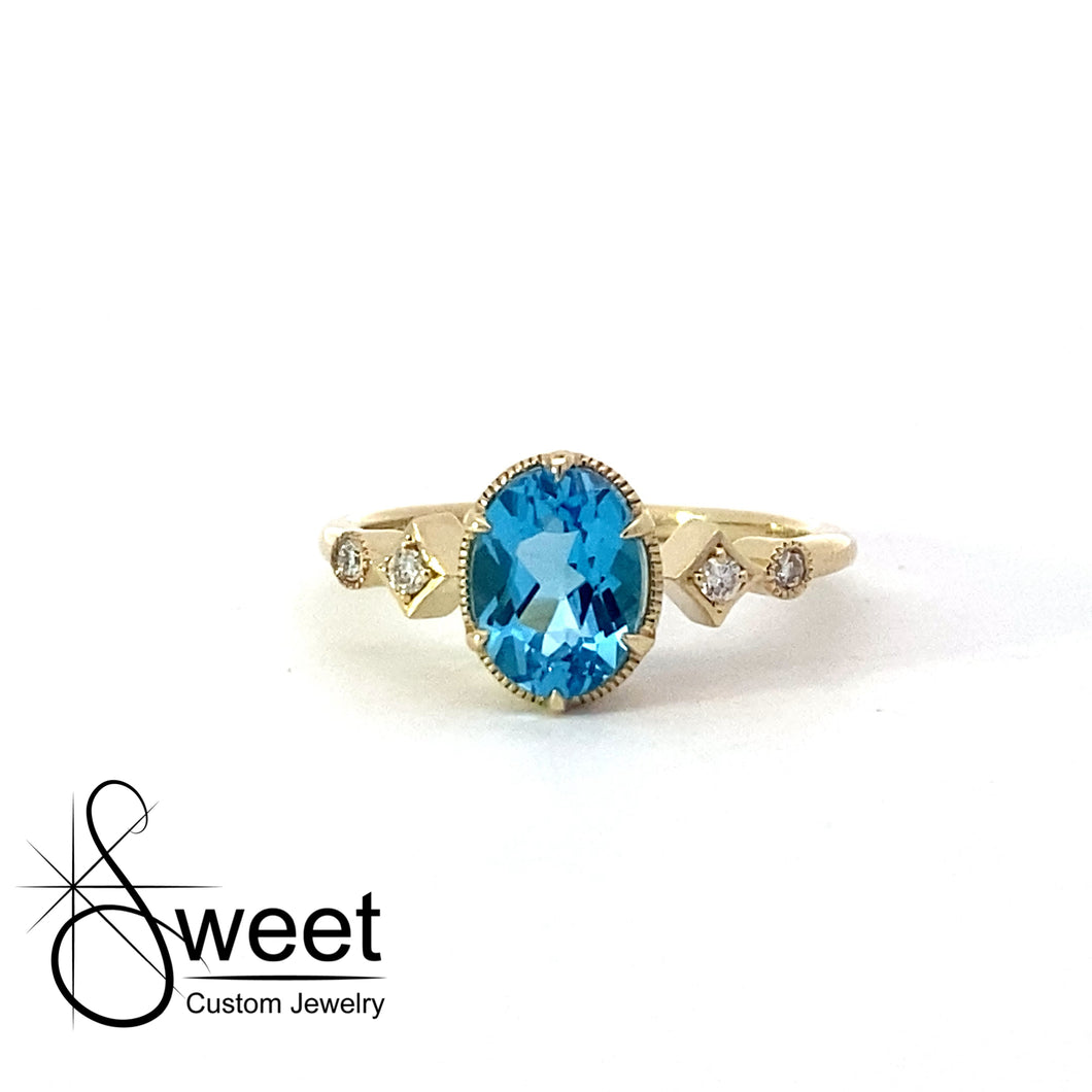 Yellow gold blue topaz and Diamond ring