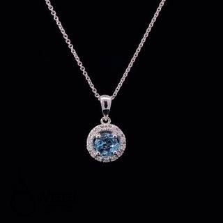14kt white gold blue topaz and diamond pendant