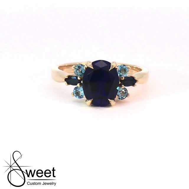 14kt yellow gold sapphire and blue topaz ring