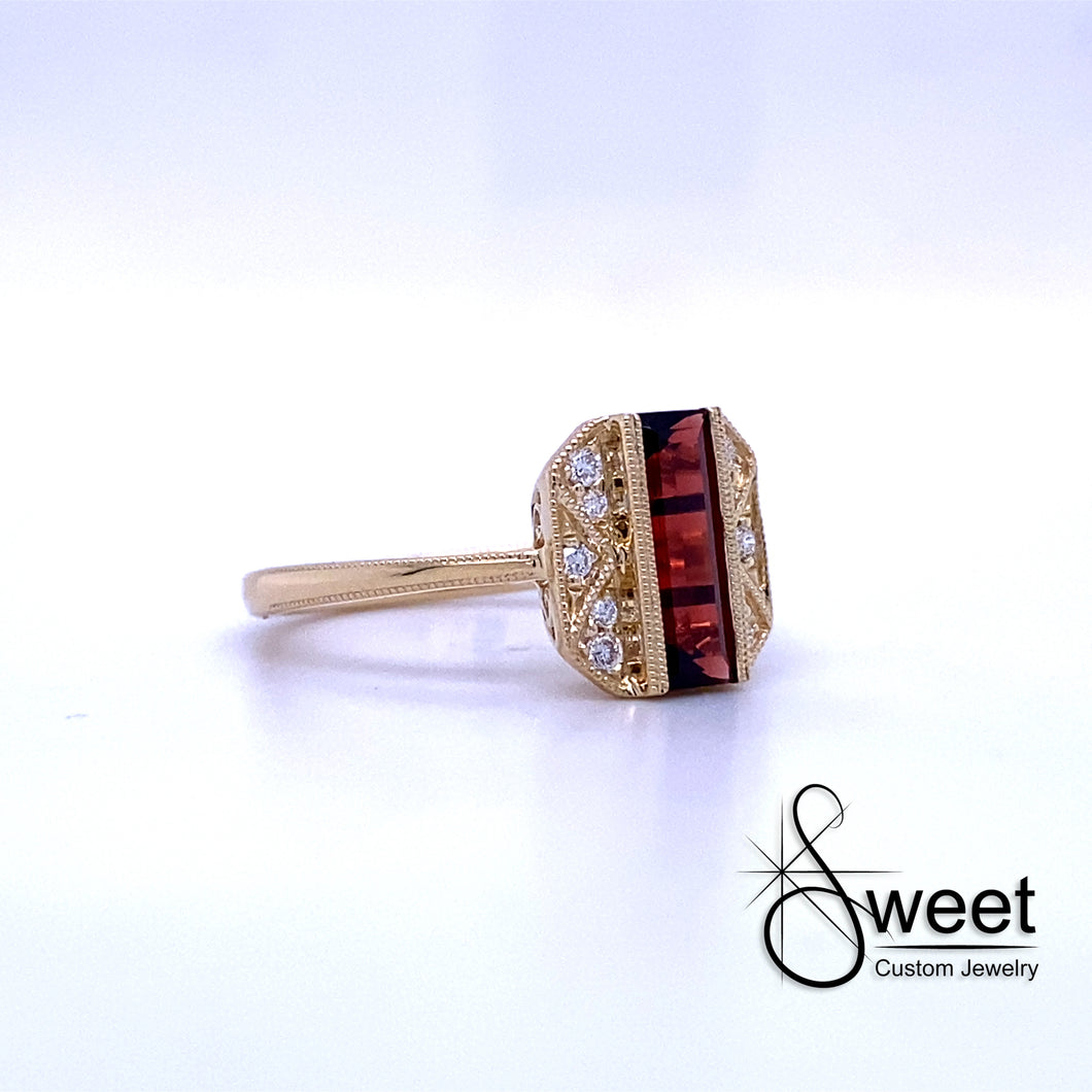14KT YELLOW GOLD GARNET AND DIAMOND RING