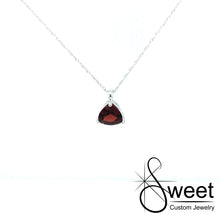 Load image into Gallery viewer, ONE 10kt WHITE GOLD PENDANT FEATURING ONE TRILLION SHAPED GENUINE GARNET