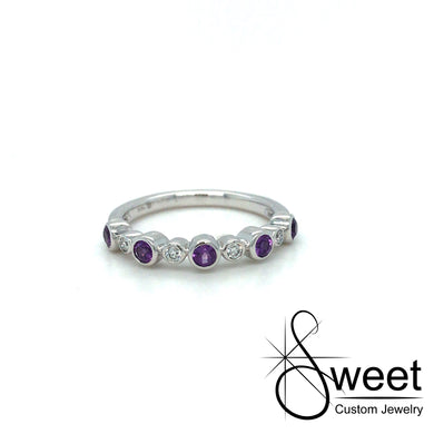 14kt WHITE GOLD RING FEATURING ALTERNATING BEZEL SET GENUINE AMETHYST .29CTTW AND ROUND BRILLIANT CUT DIAMONDS