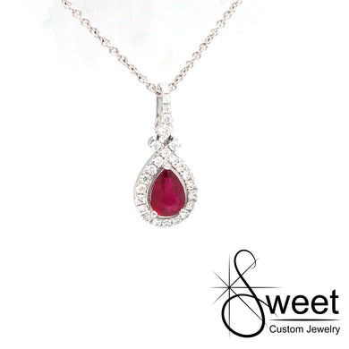 ONE 14KT WHITE GOLD PEAR RUBY AND DIAMOND NECKLACE