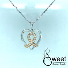 Load image into Gallery viewer, 14KT WHITE GOLD HEART SHAPED PENDANT WITH YELLOW GOLD AND DIAMOND RIBBON IN THE CENTER