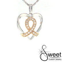 Load image into Gallery viewer, 14KT WHITE GOLD HEART SHAPED PENDANT WITH YELLOW GOLD AND DIAMOND RIBBON IN THE CENTER
