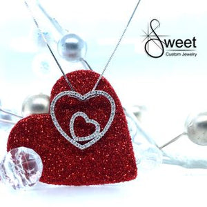 14KT WHITE GOLD DIAMOND HEART .25CTTW FROM THE ESTATE COLLECTIONWITH A 18 INCH BOX CHAIN