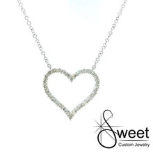 Load image into Gallery viewer, 14kt WHITE GOLD NECKLACE FEATURING ONE STATIONARY HEART WITH ROUND DIAMONDS .35CTTW. THE CHAIN IS ADJUSTABLE FROM 16-18&quot;