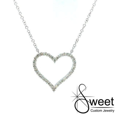 14kt WHITE GOLD NECKLACE FEATURING ONE STATIONARY HEART WITH ROUND DIAMONDS .35CTTW. THE CHAIN IS ADJUSTABLE FROM 16-18