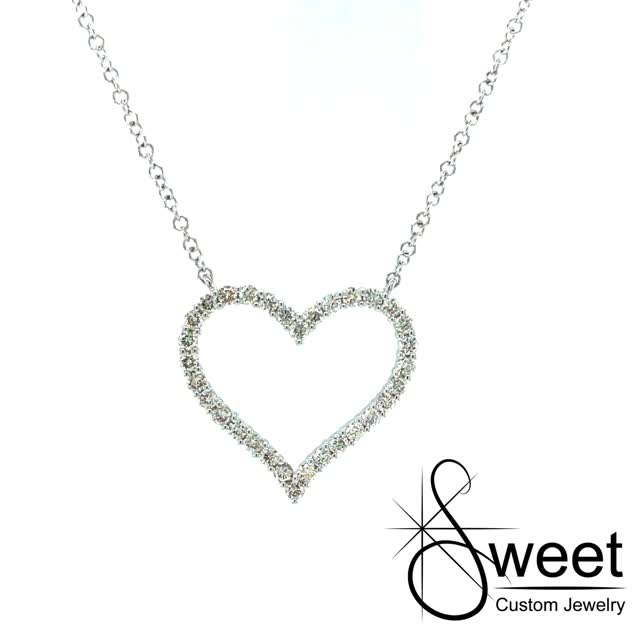 14kt WHITE GOLD NECKLACE FEATURING ONE STATIONARY HEART WITH ROUND DIAMONDS .35CTTW. THE CHAIN IS ADJUSTABLE FROM 16-18
