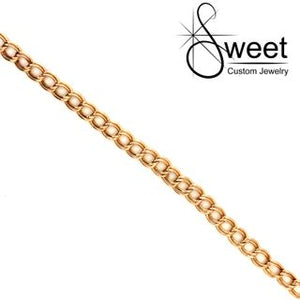 one 14kt yellow gold double link charm bracelet 7 inch