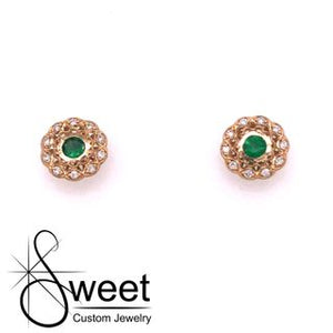 ONE PAIR OF 14KT YELLOW GOLD LATTICE STYLE STUDS EACH FEATURING ONE GENUINE 3.5MM EMERALD ACCENTED BY ROUND BRILLIANT CUT DIAMONDS