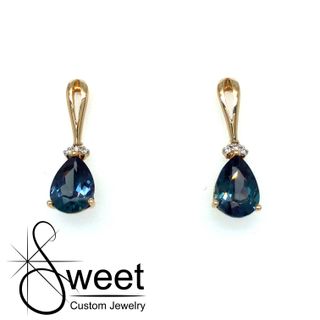 14KT YELLOW GOLD CREATED ALEXANDRITE TEAR DROP EARRINGS.