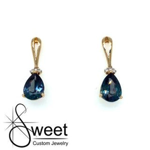 14KT YELLOW GOLD CREATED ALEXANDRITE TEAR DROP EARRINGS.
