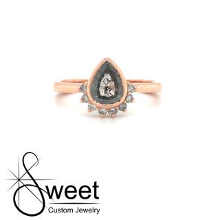 ONE 14KT ROSE GOLD RING FEATURING ONE GENUINE SALT AND PEPPER DIAMOND,