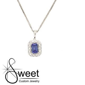 White gold tanzanite and diamond pendant