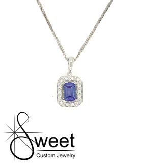 White gold tanzanite and diamond pendant