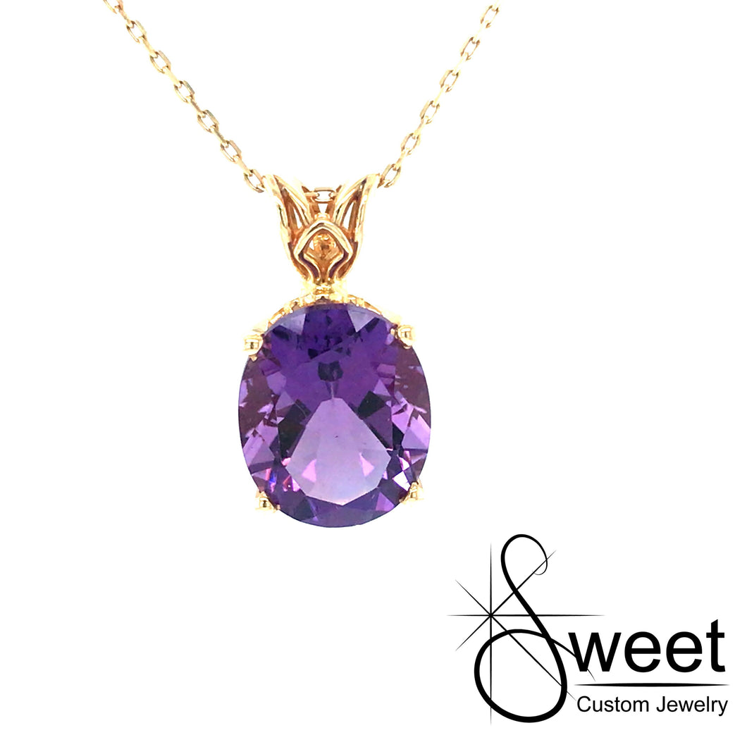 14KT YELLOW GOLD PEDNANT FEATURING ONE AMETHYST