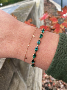 Lab created emerald tennis bracelet