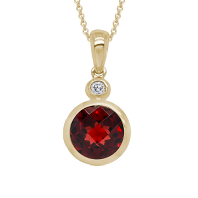 ONE 14KT YELLOW GOLD GARNET PENDANT.