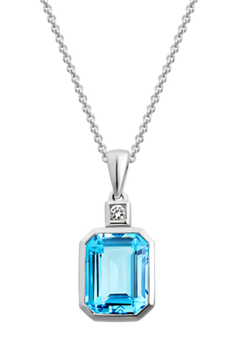 ONE 14KT WHITE GOLD EMERALD CUT BLUE TOPAZ