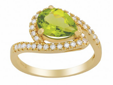 ONE 14kt YELLOW GOLD PERIDOT AND DIAMOND RING.