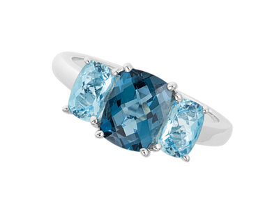 14kt WHITE GOLD RING FEATURING ONE LARGER CUSHION SHAPED LONDON BLUE TOPAZ