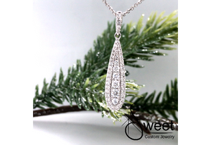 ONE 10KT WHITE GOLD VINTAGE STYLE DIAMOND PENDANT TEAR DROP SHAPED FEATURING ROUND BRILLIANT CUT DIAMONDS