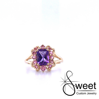 ONE 14KT YELLOW GOLD FASHION RING FEATURING AN 8X6 AMETHYST AND ACCENTING PINK TOURMALINE FROM OUR ESTATE COLLECTION.